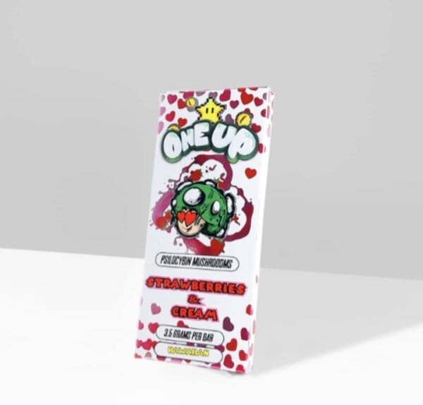 "One Up Strawberries and Cream Mushroom Bar blends the sweet, creamy flavors of strawberries and cream with the benefits of functional mushrooms, delivering a delicious, wellness-boosting treat that enhances focus and vitality."